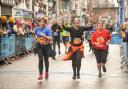 Racing to the finish line on Eastgate Street. All pictures: Simon Warburton.