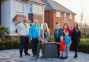 With Redrow's Kelly Toner are Chris Marchant, Matthew Cowan, Lilly, William, Winston, Thoedore and Helen Cowan.