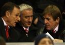 (L-R) Former Liverpool footballers Phil Thompson and Ian Rush with Liverpool's academy manager Kenny Dalglish in the stands