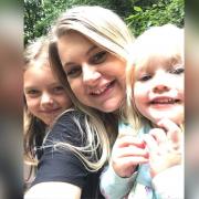 Ellesmere Port mum Laura Hinde with her two daughters.
