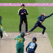 England's Sophie Ecclestone (right) stretches for the ball from the batting of South Africa's Chloe Tryon during the second Women's One Day International Series match at the 1st Central County Ground, Brighton. PRESS ASSOCIATION Photo.