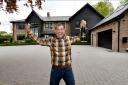 Omaze Cheshire winner Kevin Bryant outside his new 3.5 million home