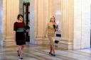 Former first minister Arlene Foster (left) and deputy first minister Michelle O’Neill walk together as they arrive at Stormont prior to announcing the Executive’s approach to coronavirus decision-making (Liam McBurney/PA)