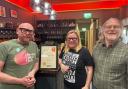 That Beer Place receiving their certificate.