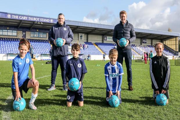 Chester FC Community Trust chief executive Jim Green and the Duke of Westminster, Hugh Grosvenor, with Hugo McLintock, 11, Henry Stewart, 10, George Grinsditch, nine and Mya Oxley, 10.