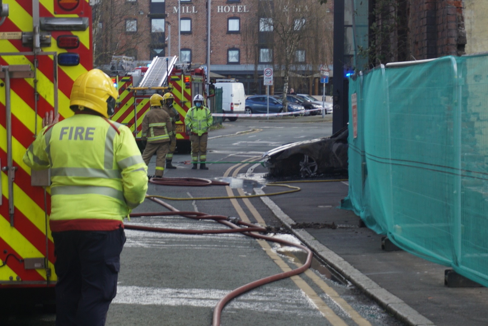 Firefighters at the scene of the garage fire in Charles Street, Chester.