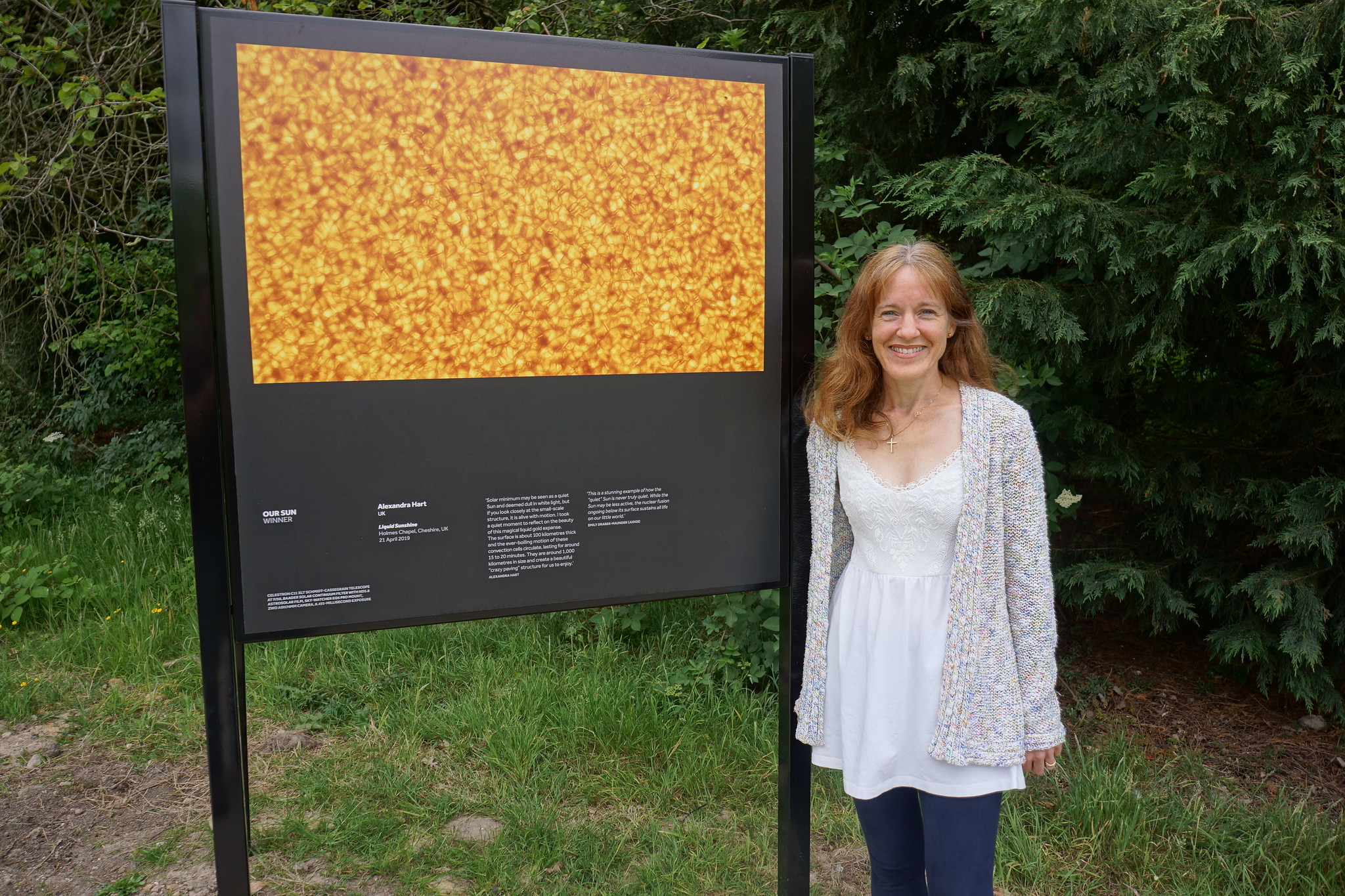 Royal Observatory Greenwichs Exhibition: Alexandra Hart with her exhibition image at Jodrell Bank.