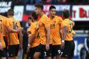 Wolverhampton Wanderers' Raul Jimenez (centre right) celebrates scoring his side's first goal of the game with team mates during the UEFA Europa League second qualifying round second leg at Seaview, Belfast. PRESS ASSOCIATION Photo. Picture date: 