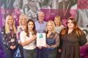 The team with their homecare.co.uk certificate