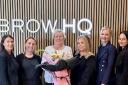 Competition winner Christine Kelly  with the Brow HQ team.