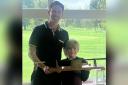 Lucca Jones and his father Richard with the Faldo 7-iron trophy.