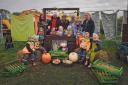 Residents at Deewater Grange enjoying pumpkin picking with local youngsters.