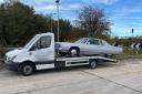 Police stopped a 3.5-tonne transporter which was carrying a vintage American car to the south of England – only to be found 1105kg overweight