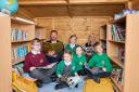 Redrow has donated an outdoor reading hut to Sutton Green Primary school as a prize following the Kings Coronation drawing competition. Pictured with Redrow's Chris Edwards and Caroline Thompson-Jones are pupils LtR: Joshua, Marcie, Hattie, Ameleie