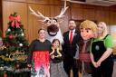 Messy Mischief Makers received money from the Ledsham community fund to host a familyfriendly Christmas Event.Pictured with Redrow's Rob McCann are LtR: Sonia Vickers, Millie and Ellena Ward from Reptiles Off Roading
