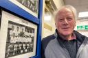 Dennis Reeves beside his photo outside the Chester FC Legends Lounge. Photo by Ian Cooper.