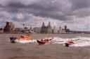 Today’s volunteer crews will recreate an image taken 25 years ago to the day of the region’s lifesavers against the iconic city skyline.