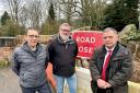 Labour council candidate Neil Connolly, Cllr Mike Ryan and Mike Amesbury MP at the scene of the damaged bridge
