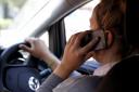 Anyone caught driving while using mobile phone faces a £200 fine and six penalty points on their licence