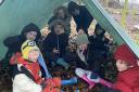 Frodsham children enjoy life under canvas during a forest school session in the school grounds.