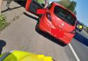 The red Corse stopped by Cheshire Police. Picture: North West Motorway Police