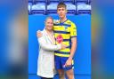 Claire Milby, who is expanding her Travel The Globe independent travel agency to serve customers in Cheshire, pictured with 16-year-old son Noah High who has just received his first call up to make his debut for Warrington Wolves Academy.