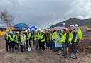 Patients, community members, developers, the local scout group and NHS representatives at the groundbreaking ceremony.