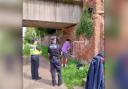 Police monitor offenders clearing graffiti vandalism on the Chester canal towpath. Picture: Cheshire Police Rural Crime Team.