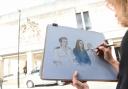 Court artist Elizabeth Cook drawing a sketch of Lucy Letby outside Manchester Crown Court.