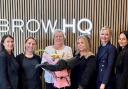 Competition winner Christine Kelly  with the Brow HQ team.