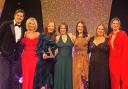 Some of the Pure Perfection Clinic team at the Aesthetics Awards, including director Sara Cheeney (with the award) and host Vernon Kay.