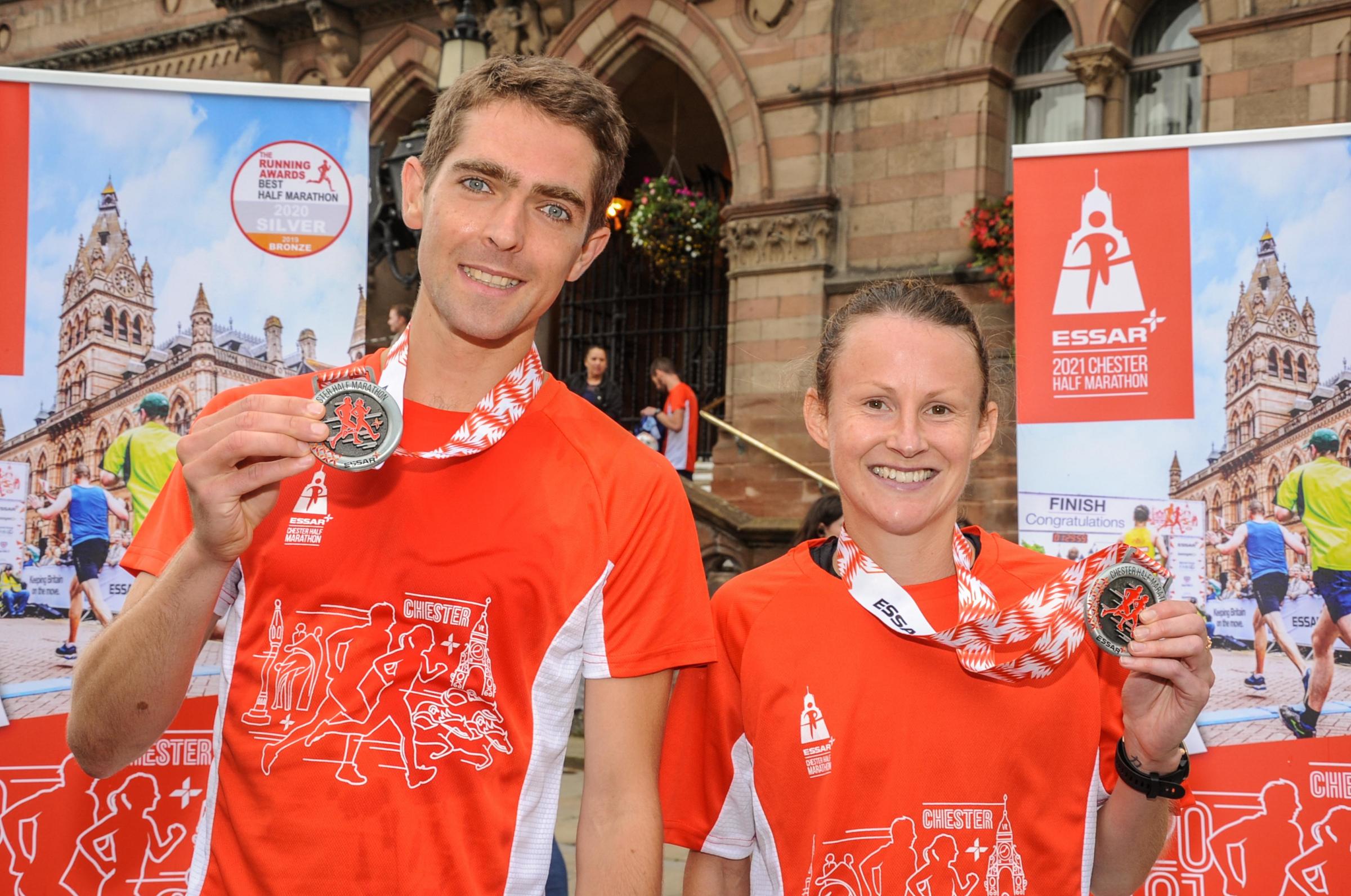 Chester Racecourse and Chester Town Hall, Essar 2021 Chester Half Marathon. Picture Winners 1st man Jonathan Escalante-Phillips and 1st Lady Tracy Barlow. SW19092021.