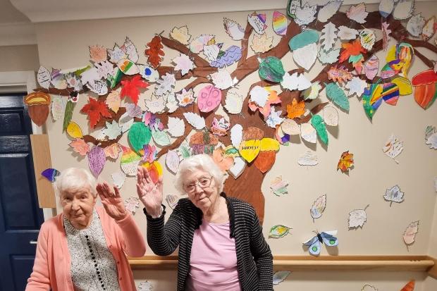 Deewater Grange residents Hilde and Margaret with the home's special tree-inspired artwork for The Big Draw.