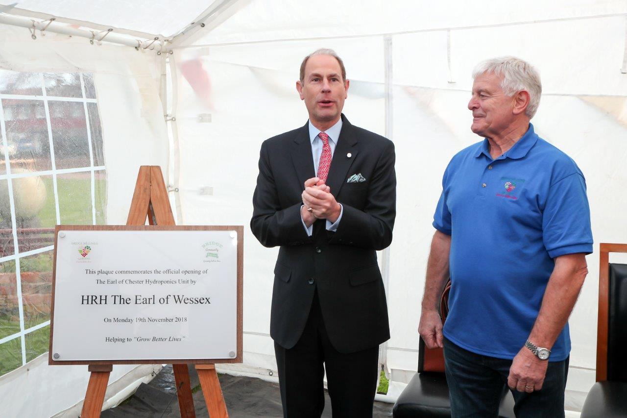 Prince Edward unveils the official plaque with Francis Ball, Chairman of Bridge Community Wellness Gardens and Farm