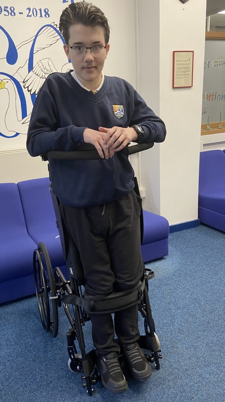 Ethan Slater with his standing wheelchair.