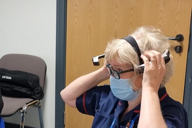 Nurse with Head Mounted Tablet. Picture credit: Sasha Taylor.