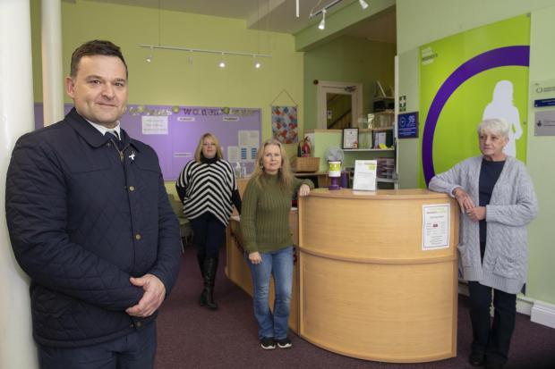 North Wales Deputy Police and Crime Commissioner Wayne Jones at the North Wales Women’s Centre in Rhyl with, from left, Abby Lewis, office co-ordinator; Gemma Fox, Managing Director; and Yvonne Wild, Project Manager.
Picture Mandy Jones