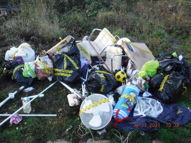 Fly-tipping in Ellesmere Port, where an electric fan, a punch bag and chairs were among the litter.