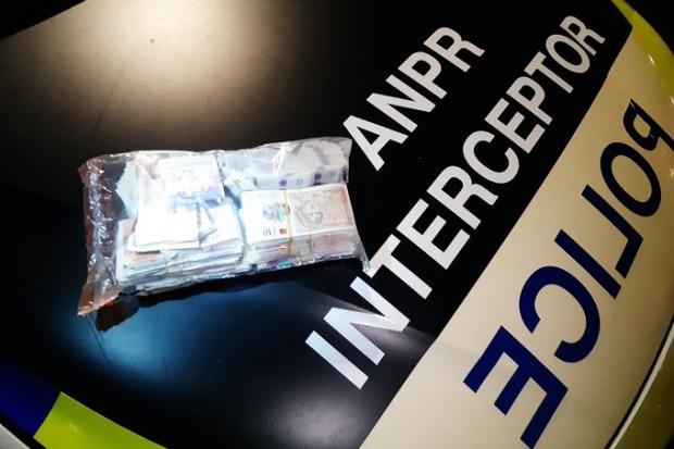 The money seized by police at Lymm Services