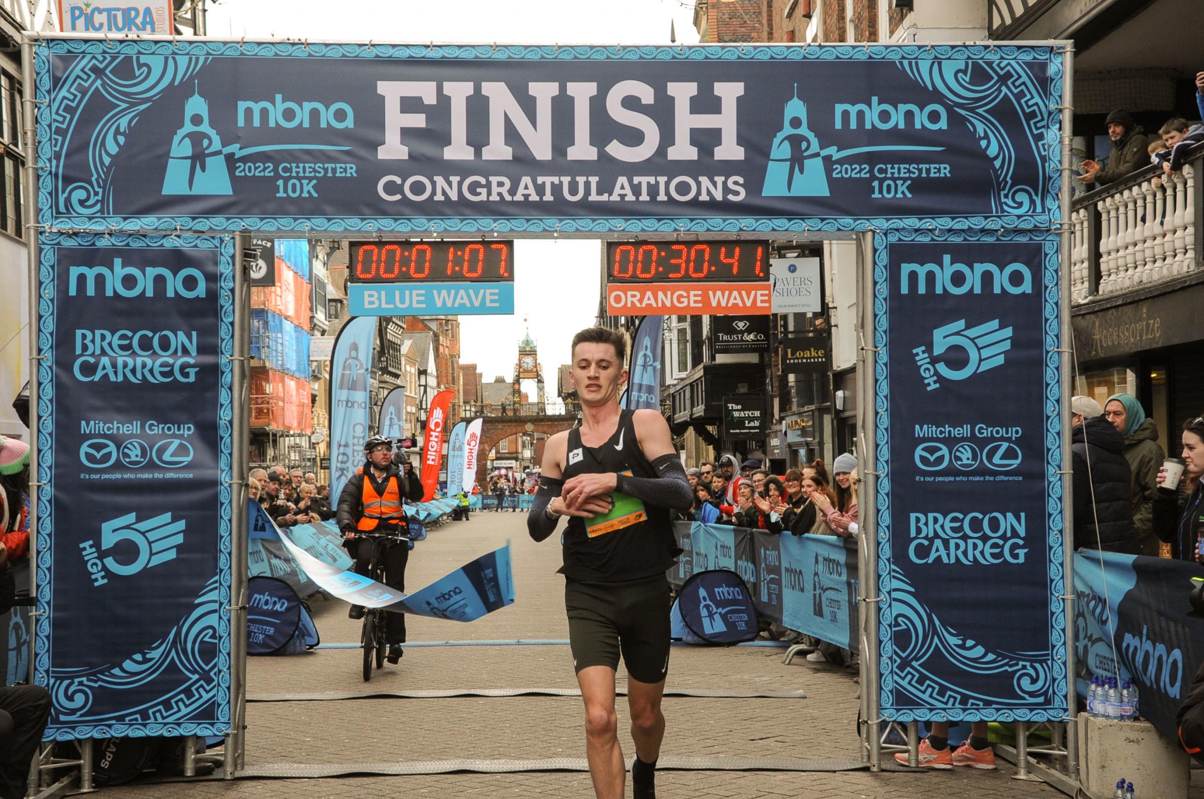 MBNA Chester 10K Race, Picture winning man to cross the line Daniel Jarvis from the Wirral. SW13032022.