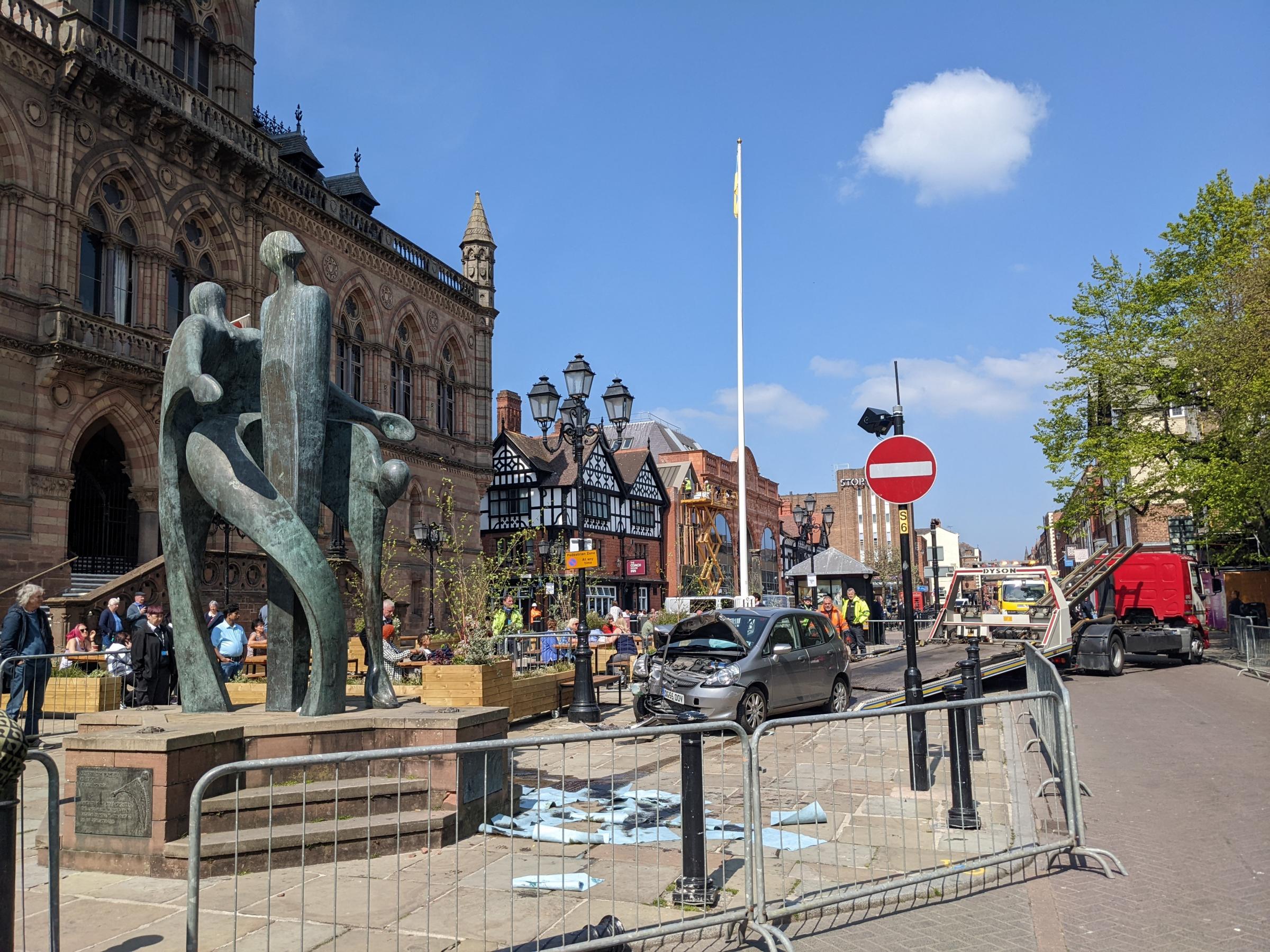 The car after it had struck the statue by Chester Town Hall.