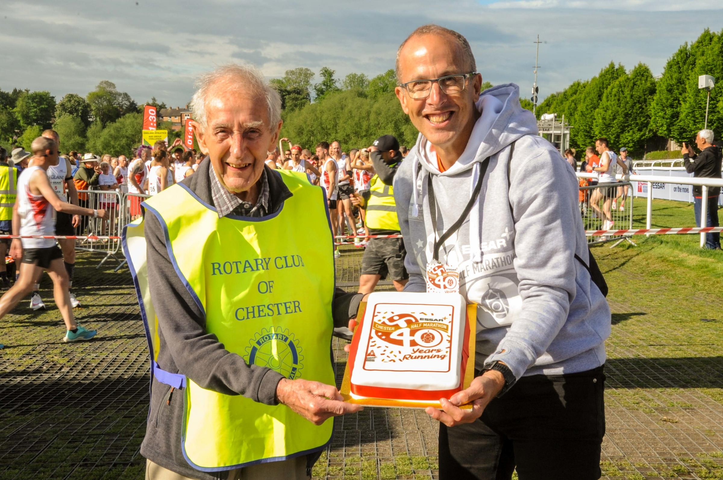 Birthday celebrations as Dr Basil Thomson, organiser of the first Chester Marathon, with todays Chester Marathons organiser Chris Hulse.