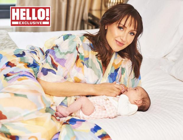 Chester and District Standard: Catherine Tyldesley with her baby daughter Iris as they appear in this week's edition of the magazine. Credit: Hello! Magazine/PA