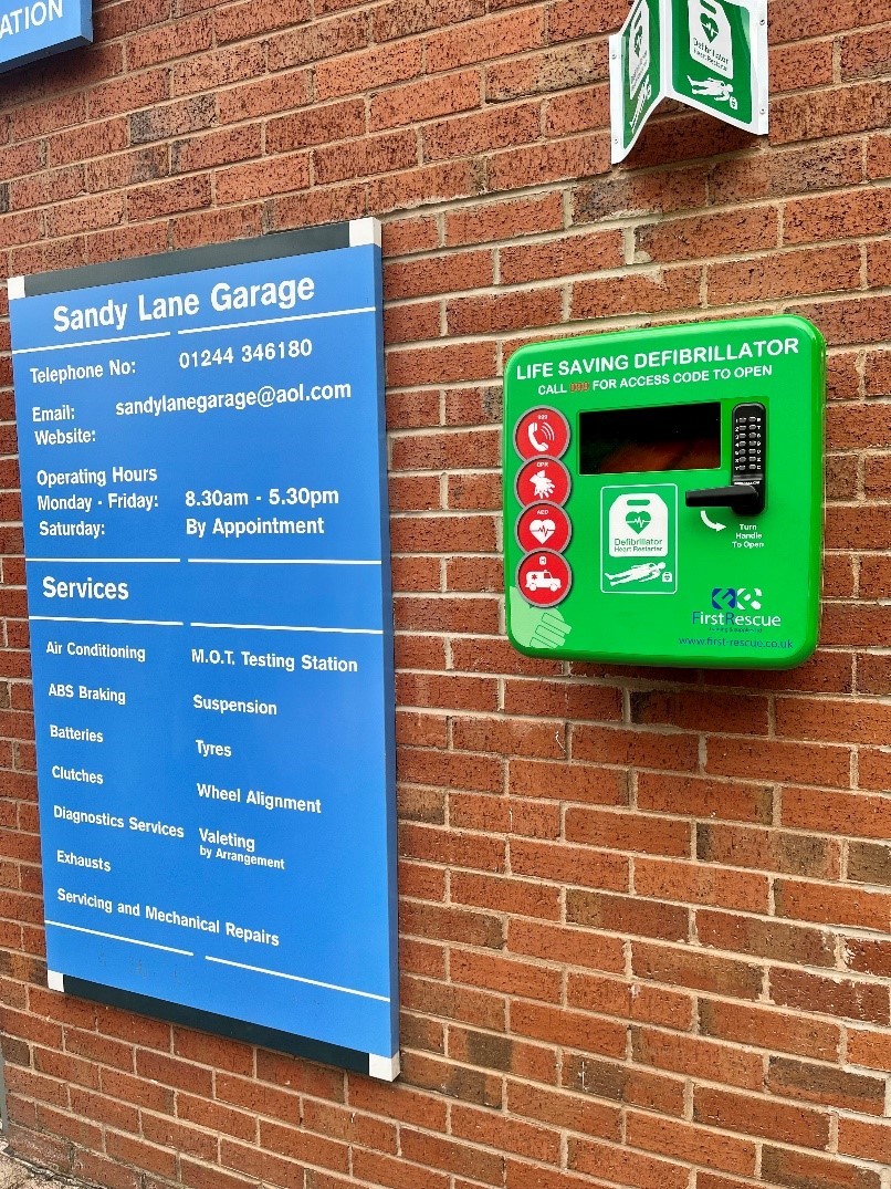 The new defibrillator installed at the Sandy Lane Garage in Chester.