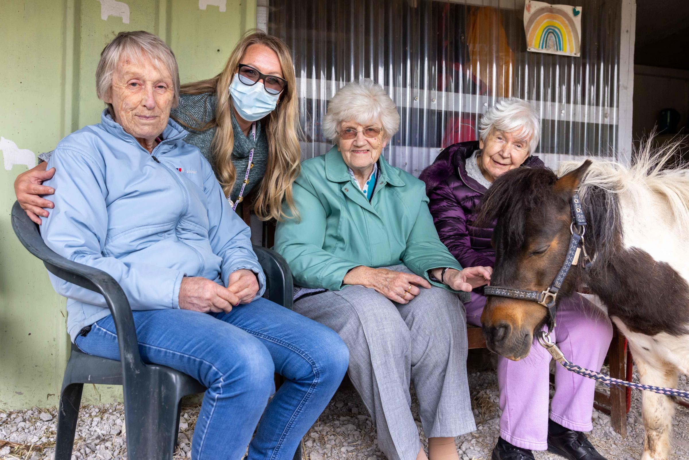 Deewater Grange care home residents visit Spirit of the Herd Sanctuary, Frodsham. Residents Diana Hughes, Jean Charlton and Hilda Rollason with Sally Cooper, Deewater Grange care home manager behind.