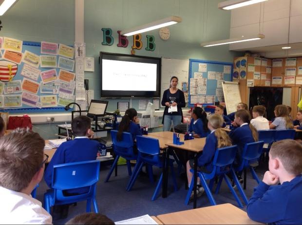 Chester and District Standard: Sara giving a talk on hidden disability awareness in a local school.