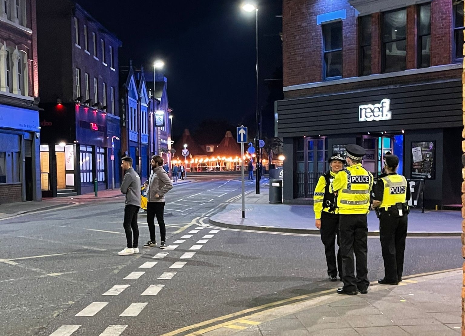 Police pictured on Bridge Street at night