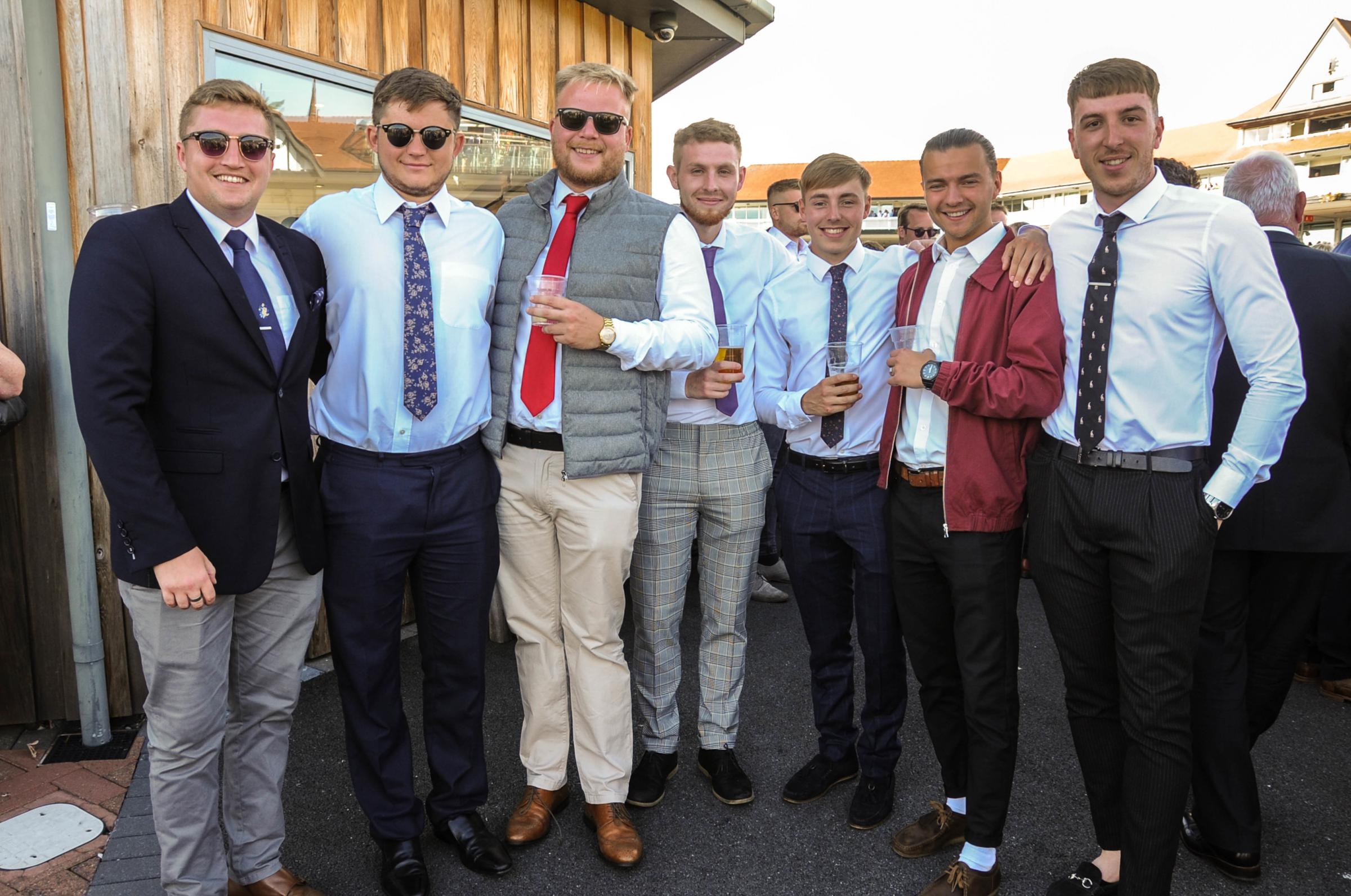 Chester Racecourse, Ladies & Gents Evening. On a boys night out are Tom Farrett, centre, with friends. 