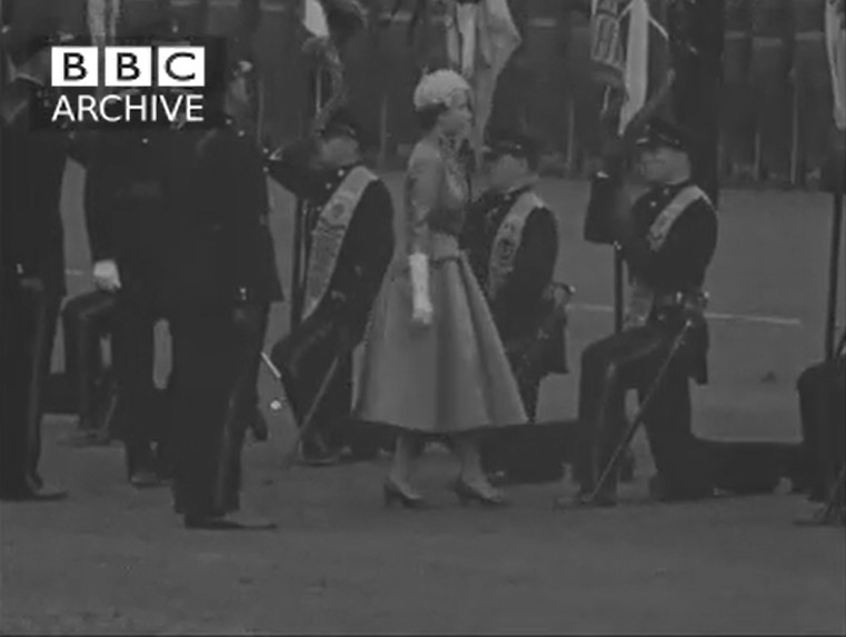 The Queen presents new colours to the Cheshire Regiment and later visits the new Chester Town Hall with the Duke of Edinburgh in 1957. Picture: BBC Archive.