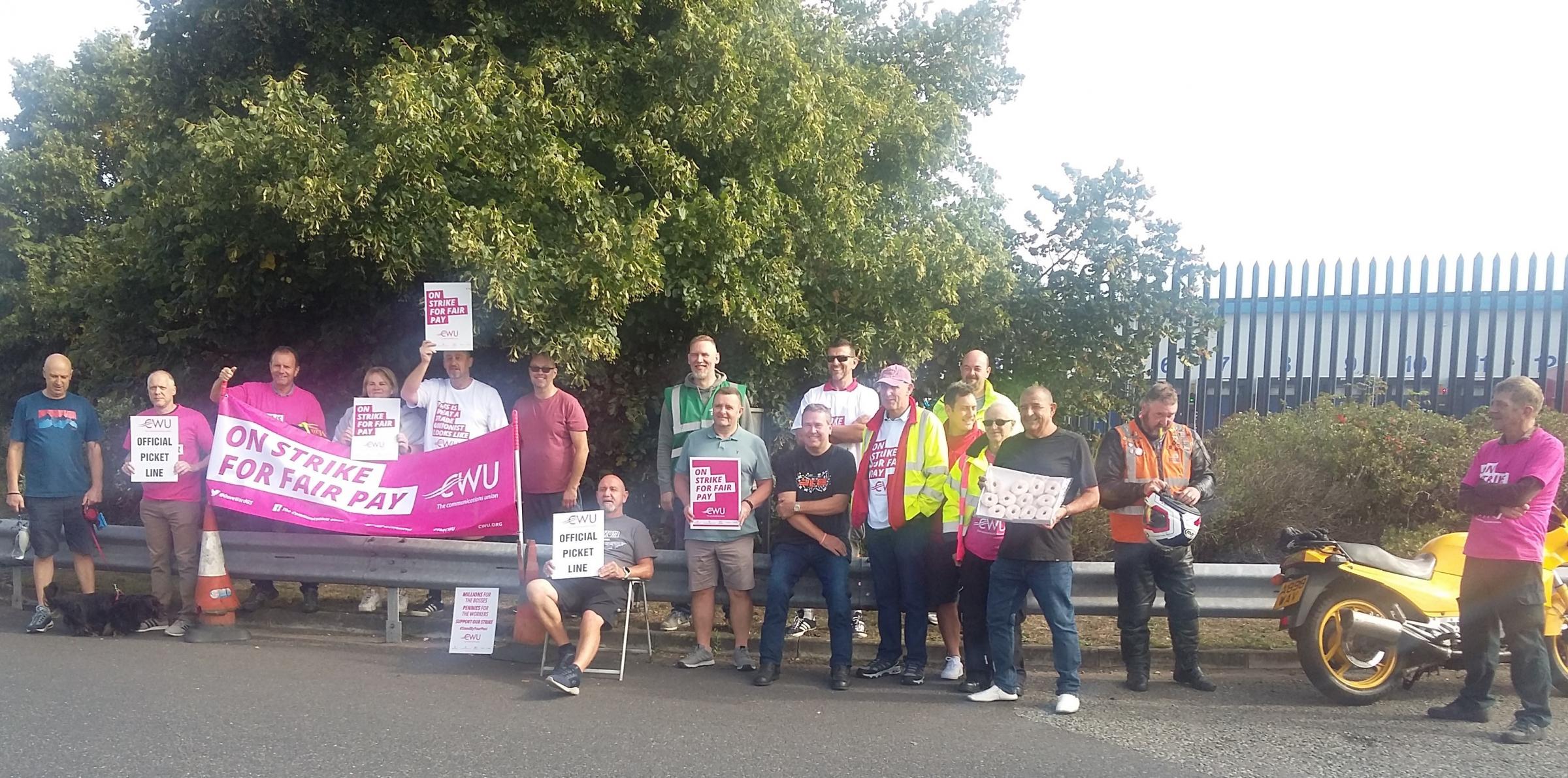 CWU members strike for a better pay deal. Pictured are CWU members on the Sealand Road Sorting and Transport Depot picket line. Photo by Ray McHale.